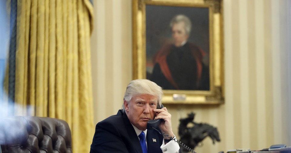 Trump posing with picture of Andrew Jackson